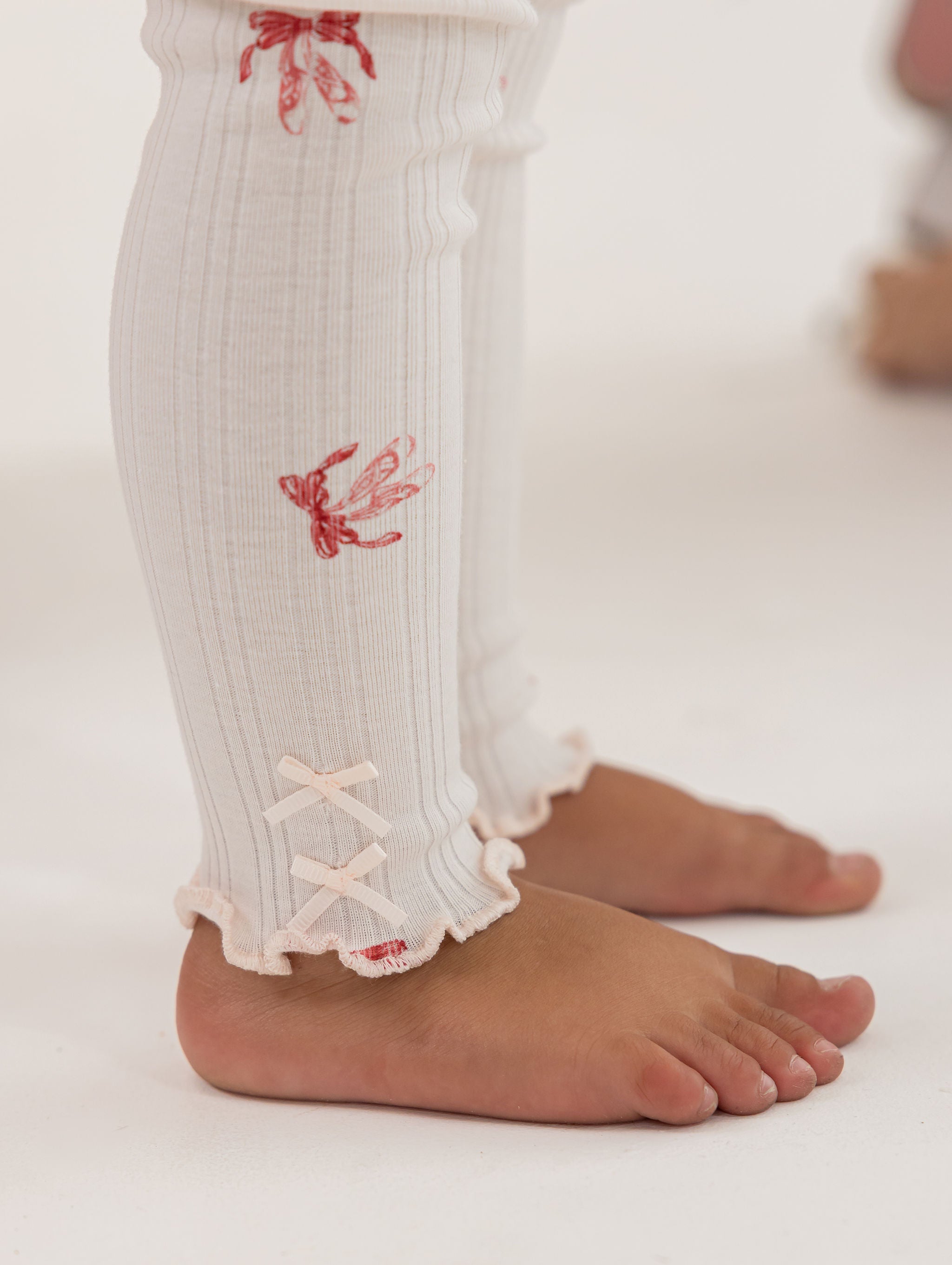 סט בגד גוף ומכנסיים פפיונים